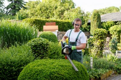Landscaper Using Pruners